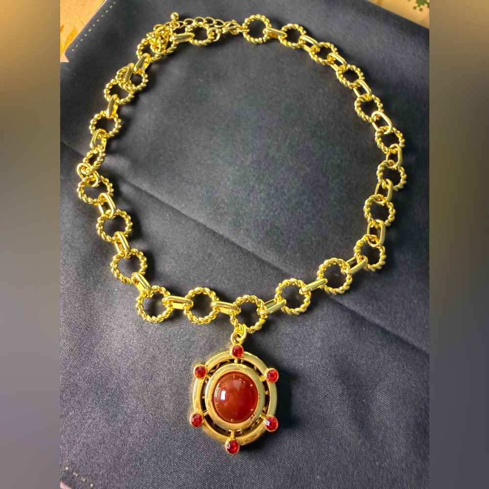 Elegant Gold Necklace with Red Accents